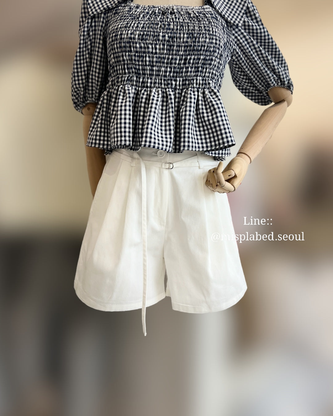 double belted pleated shorts