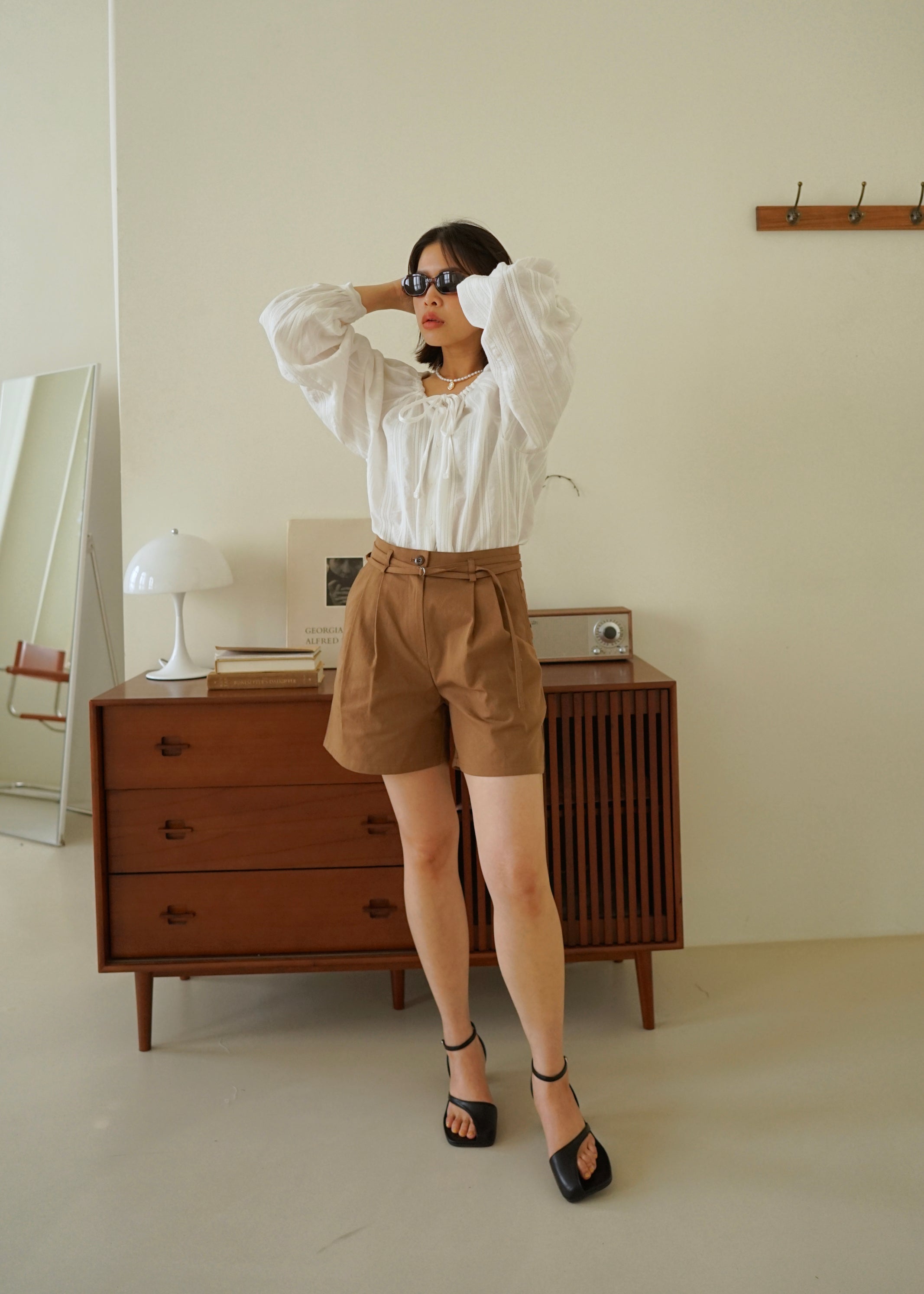 double belted pleated shorts